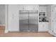 Bright kitchen featuring stainless steel refrigerator and ample cabinet space at 1900 Sunset Ave, Durham, NC 27705