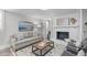 Cozy living room showcasing a decorative fireplace and comfortable seating arrangement at 1900 Sunset Ave, Durham, NC 27705