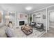 Inviting living room featuring a fireplace, stylish decor, and comfortable seating at 1900 Sunset Ave, Durham, NC 27705
