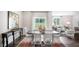 Elegant dining room with a large table, comfortable chairs, and stylish decor at 20 Granite Falls Way, Youngsville, NC 27596