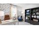 Cozy home office featuring a desk, chair, bookcase, and bright natural light at 20 Granite Falls Way, Youngsville, NC 27596
