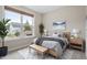 Bedroom with a large window for natural light and hardwood floors at 2005 Ernesto Ln, Raleigh, NC 27603