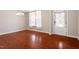 A bright dining room features gleaming hardwood floors and natural light at 2005 Ernesto Ln, Raleigh, NC 27603