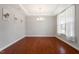 Spacious dining room featuring hardwood floors and a tray ceiling at 2005 Ernesto Ln, Raleigh, NC 27603