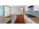 Modern kitchen with stainless appliances, granite countertops and tiled backsplash at 2005 Ernesto Ln, Raleigh, NC 27603