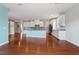 Bright kitchen with large island, white cabinets, and stainless steel appliances at 2005 Ernesto Ln, Raleigh, NC 27603