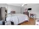Cozy bedroom with a ceiling fan, hardwood floors, and lots of natural light at 206 Hamby St, Clayton, NC 27520