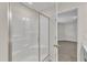 Walk-in shower with a clear glass enclosure at 252 Olde Place Dr, Zebulon, NC 27597