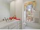 Bright bathroom with a single vanity and a large window that brings in lots of natural light at 2602 Vintage Hill Ct, Durham, NC 27712