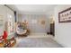 Charming room with nautical decor, comfortable seating, and bright natural light at 2602 Vintage Hill Ct, Durham, NC 27712
