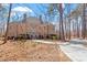 Traditional brick home with a manicured front yard and a circular driveway at 2602 Vintage Hill Ct, Durham, NC 27712