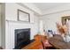 Living area with a fireplace, hardwood floors, and natural light at 2602 Vintage Hill Ct, Durham, NC 27712