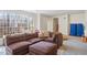 Spacious living room features large window, comfortable seating and neutral carpet at 2602 Vintage Hill Ct, Durham, NC 27712