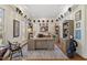 Bright home office with custom built-ins, natural light, and hardwood floors, promoting productivity at 2602 Vintage Hill Ct, Durham, NC 27712