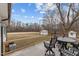 View of the spacious deck, perfect for outdoor dining and enjoying the serene surroundings at 3068 Benson Rd, Angier, NC 27501