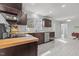 Kitchen with butcher block countertops, tile floors, and stainless steel appliances at 3068 Benson Rd, Angier, NC 27501