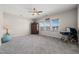 Well lit bedroom with carpet, ceiling fan and three windows at 3356 Longleaf Estates Dr, Raleigh, NC 27616