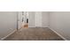Neutral bedroom with carpeting and a view to another room at 3356 Longleaf Estates Dr, Raleigh, NC 27616