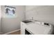 Well lit laundry room with washer and dryer included at 3356 Longleaf Estates Dr, Raleigh, NC 27616