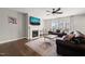 Bright living room with fireplace, hardwood floors, and lots of natural light at 3356 Longleaf Estates Dr, Raleigh, NC 27616