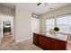 Cozy home office with natural light and a classic wooden desk at 3356 Longleaf Estates Dr, Raleigh, NC 27616