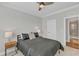 Cozy bedroom featuring neutral tones, a comfortable bed, and minimalist decor for a peaceful retreat at 372 Natsam Woods Way, Wake Forest, NC 27587