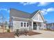 The community center with stone facade and bench sitting area out front at 372 Natsam Woods Way, Wake Forest, NC 27587