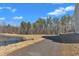 The peaceful and scenic paved path in the Joyner Greenway with pond views at 372 Natsam Woods Way, Wake Forest, NC 27587