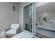 Balcony with stylish seating offering a glimpse into the bedroom, enhancing indoor-outdoor flow at 4007 Southpoint Landing Way, Durham, NC 27707