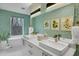 Bathroom featuring wallpaper, a double sink vanity, and natural light at 4007 Southpoint Landing Way, Durham, NC 27707