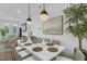 Bright dining area with a modern table, decor, and natural light at 4007 Southpoint Landing Way, Durham, NC 27707