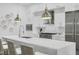 Modern kitchen boasts stainless steel appliances, sleek countertops, and ample cabinet space at 4007 Southpoint Landing Way, Durham, NC 27707