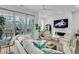 Cozy living room with modern decor, a large sliding glass door and deck access for seamless indoor/outdoor living at 4007 Southpoint Landing Way, Durham, NC 27707