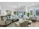 Inviting living room featuring neutral furniture, stylish decor and sliding doors leading to a private outdoor space at 4007 Southpoint Landing Way, Durham, NC 27707