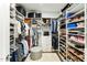 Organized walk-in closet with built-in shelving and storage solutions at 4007 Southpoint Landing Way, Durham, NC 27707