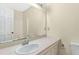 Bathroom featuring a vanity, mirror, and a toilet at 411 Colony Woods Dr, Chapel Hill, NC 27517