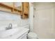 Bathroom with tub shower combo, vanity, and cabinets at 411 Colony Woods Dr, Chapel Hill, NC 27517