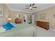 A bedroom features neutral paint, carpeted floors, a ceiling fan, and two dressers at 420 Carsons Creek Trl, Wendell, NC 27591