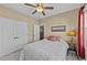 Comfortable bedroom with a ceiling fan and double-door closet at 420 Carsons Creek Trl, Wendell, NC 27591