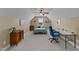 Cozy bonus room with desk, seating, and neutral decor at 420 Carsons Creek Trl, Wendell, NC 27591