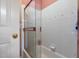 Bathroom shower features a showerhead and shower door at 715 Thompson Rd, Garner, NC 27529