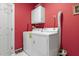 Functional laundry room featuring washer, dryer, and white cabinets at 715 Thompson Rd, Garner, NC 27529