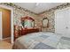 A cozy bedroom featuring classic furniture and a queen bed showcasing a comfortable retreat at 721 Thompson Rd, Garner, NC 27529