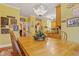 Inviting dining room with a classic chandelier and charming decor at 721 Thompson Rd, Garner, NC 27529