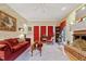 Classic living room with a brick fireplace and a cozy seating arrangement at 721 Thompson Rd, Garner, NC 27529