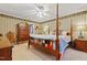 Spacious main bedroom with elegant decor, a ceiling fan, and a cozy atmosphere at 721 Thompson Rd, Garner, NC 27529