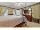 Bright main bedroom with ample natural light, elegant decor, and a comfortable bed at 721 Thompson Rd, Garner, NC 27529