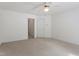 Bedroom featuring carpeted floor, two closets, and ceiling fan at 725 Littleleaf Ct, Holly Springs, NC 27540