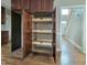 Spacious pantry with ample storage and pull-out shelving for easy organization at 725 Littleleaf Ct, Holly Springs, NC 27540