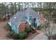 A stunning aerial view highlighting architectural details, landscaping, and overall property layout at 725 Thompson Rd, Garner, NC 27529